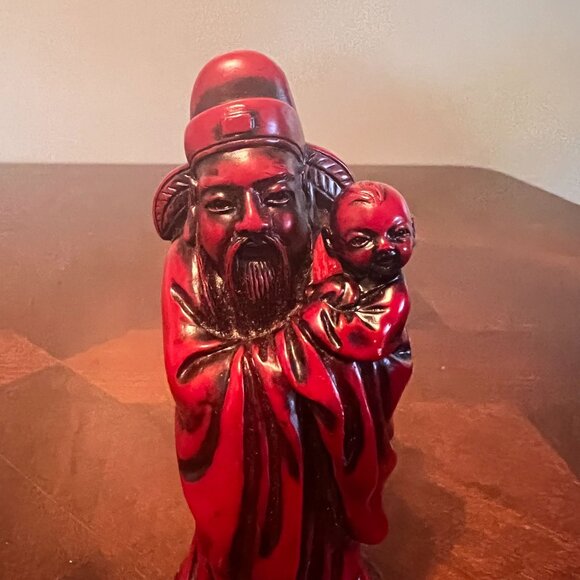 Asian-Inspired Red Resin Figurine Elder Holding Child Detailed Decorative Statue - Picture 6 of 7